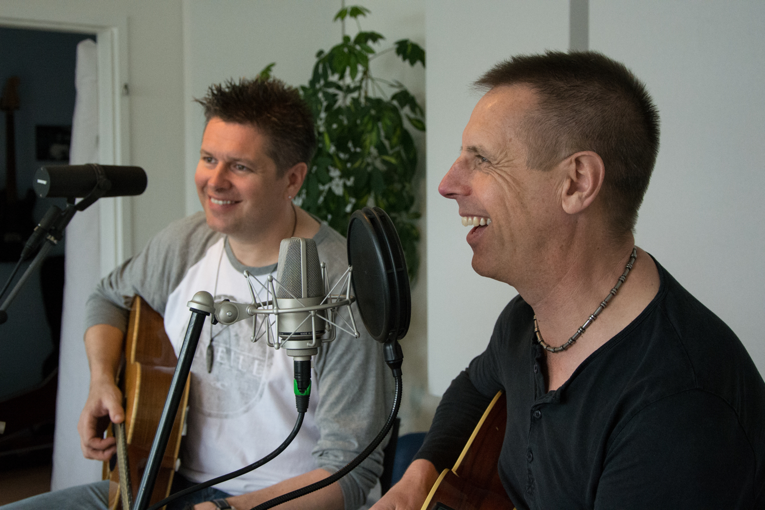 Mike and Jason in the studio, laughing