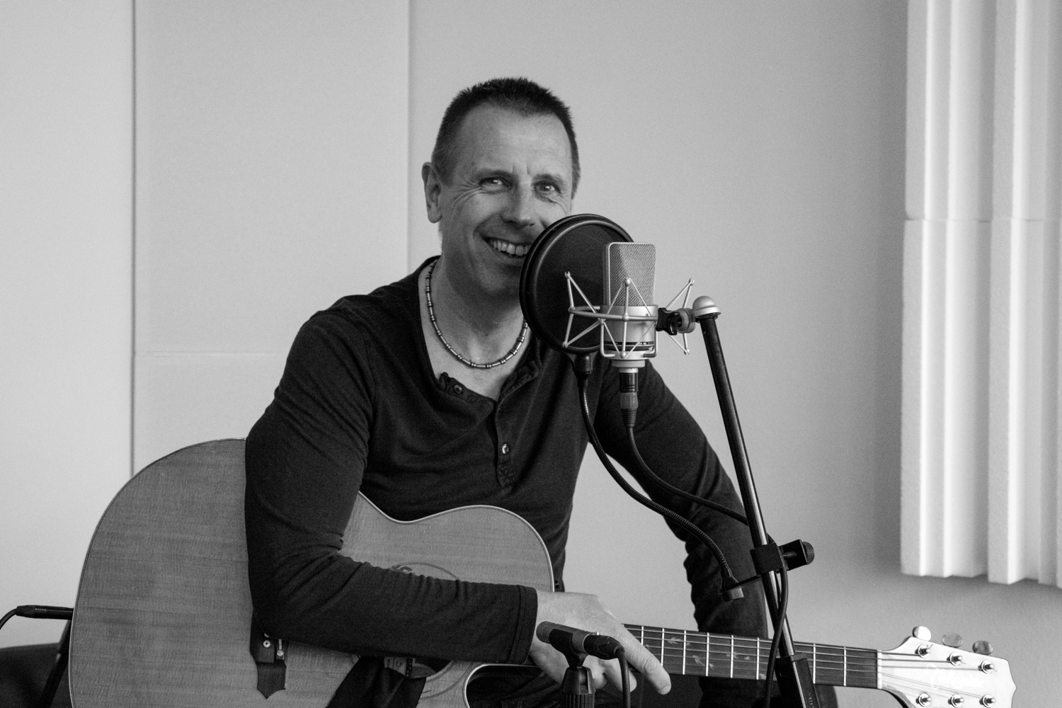 Mike at the studio microphone