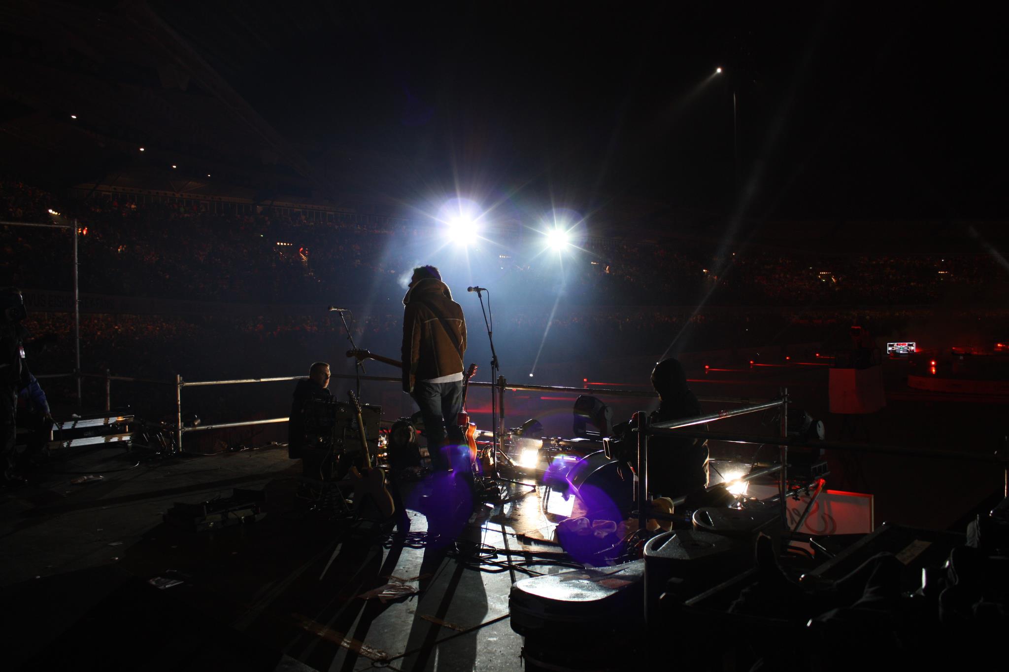 BOOTS on an open-air stage at night